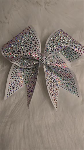 These super sparkly bows are a favorite! 🩷🩷🩷 #bowmaker #cheer #cheerbow #cheerleader #fyp