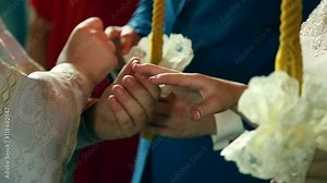 traditional Ukrainian wedding ceremony of gentle happy gorgeous couple, old church