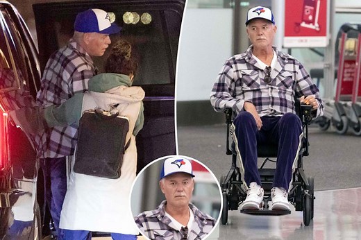 Heartbreaking photos of Eric Dane, 52, emerge as he struggles to get into wheelchair amid ALS battle