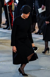 Meghan Markle Honors the Queen With a Curtsy at Coffin Procession
