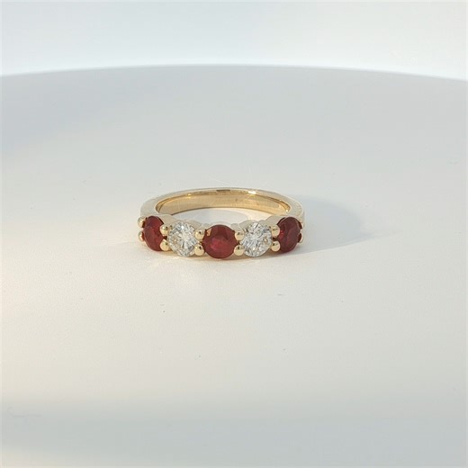 💖 This Valentine’s Day, give a symbol of devotion that speaks in diamonds and burns with ruby fire 🔥 This exquisite 5‑stone diamond and ruby ring is more than a gift — it’s a declaration. Each dazling diamond captures the brilliance of a love that endures, while the rich, velvety rubies embody passion in its most elegant form. Stop in and see it today, $5830 🌹The greatest love stories deserve the finest treasures. | Sieger's Jewelers