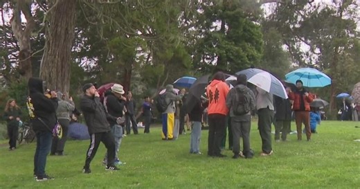 People brave the rain to celebrate 4/20 at Hippie Hill in San Francisco