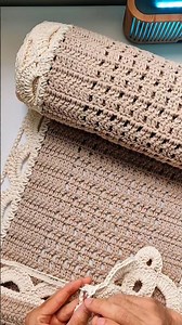 Rectangular crochet runner rug, made and reflected by Samuel Muleke, Artisan