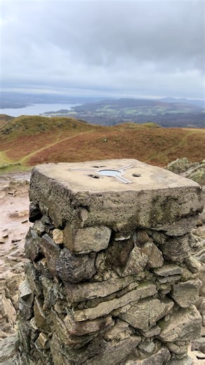 Chasing trig points will never get old… especially when they come with views like this from the top of Loughrigg Fell ⛰️✨ There’s something special about reaching a trig point. Not just the walk up, the breath-catching climbs, or the muddy boots… but that moment when you arrive, take it all in, and realise how small the busy world below suddenly feels. Loughrigg Fell might not be the tallest in the Lakes, but wow does it deliver. 360° views stretching across Windermere, Rydal Water, and the surr