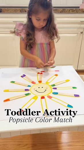 Brittany l Toddler Learning Activities 😊 on Instagram: "☀️Color matching with a summer twist! Comment SUN for a link with everything I used for this activity! ☀️🕶️ https://liketk.it/5jvHq This simple sun activity is perfect for building color recognition, matching skills, and fine motor strength—all while having fun in the sunshine! 🌈✨ My toddler loved placing the popsicle sticks in the right spot, and I loved how much learning was happening without her even realizing it! Save this idea for y