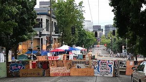 Barriers in Seattle's 'CHOP' zone remain after city talked of dismantling it Sunday