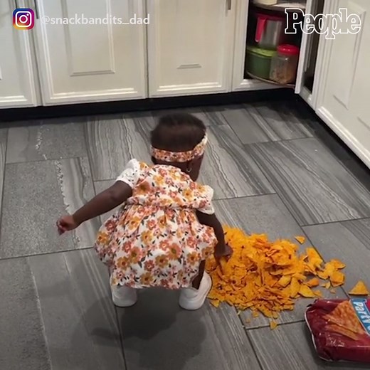 This little one loves snacks! 😂 | People