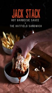 POV: You love barbecue sauce, but you need a little extra kick to really get things sizzling. Enter: Jack Stack's Hot BBQ Sauce! Our signature sauce is the perfect blend of spices and heat to give your taste buds the ultimate flavor experience. Pairs perfectly with the Hatfield sandwich - or your favorite dish! | Jack Stack Barbecue