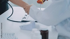 Female professional doctor examining elderly old male patient measuring high low arterial blood pressure using medical tonometer at hospital checkup appointment visit. Seniors hypertension concept.