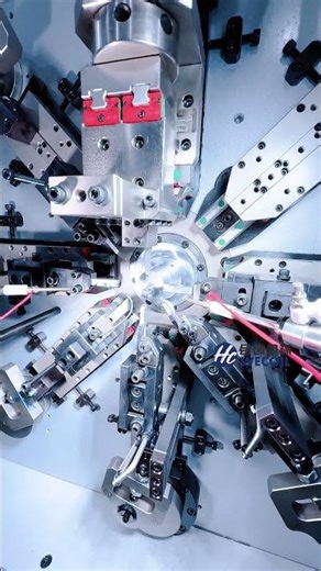 1.2mm double torsion spring making. Wecoil HCT-1025 camlesss wire forming machine with free arm.