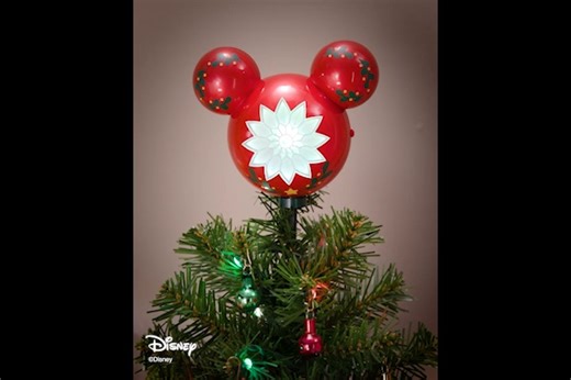 A magical, mini tree for Disney fans? Oh boy! ❤️ 🤍 Pick up the ShowToppers mini tree and the topper at Ornament Premiere in July and you'll save $10. https://bit.ly/49TjUUd | Hallmark Keepsake Ornaments