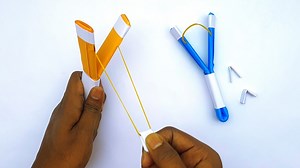 Handmade easy paper slingshot that shoots - School project ideas - DIY rubber band craft idea #Crafts #PaperSlingshot #PaperToys | Mr. Creator