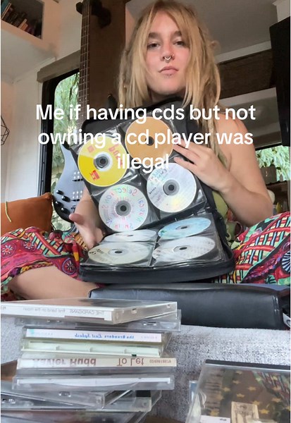 The Humor of Owning CDs Without a Discman