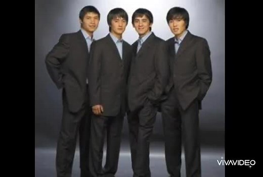 Formal Attire Presentation of Four Individuals