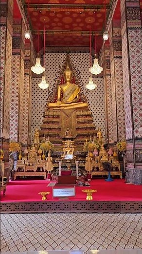 Monks chanting at Wat Arun with Golden Budda