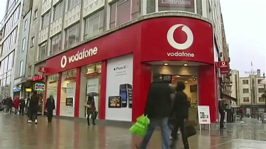 Vodafone to lift dividend for first time in eight years