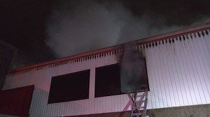 Two firefighters hurt battling fire at Spring storage facility