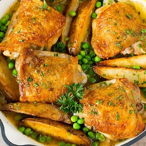 312K views · 932 reactions | RECIPE: https://www.dinneratthezoo.com/chicken-vesuvio/ This chicken Vesuvio is tender chicken thighs and potato wedges that are roasted until golden brown, then served with peas and a white wine sauce. | Dinner at the Zoo | Facebook