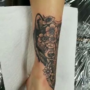 58 reactions · 4 comments | Half wolf and half elephant tattoo around an ankle. Ouch. | Color Theory Tattoo | Facebook