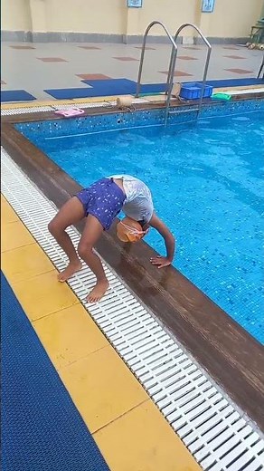 Flipping into the Pool: Gymnastics Meets Swimming!#shorts#swimming #gymnast #flip #gymnastic #stunt