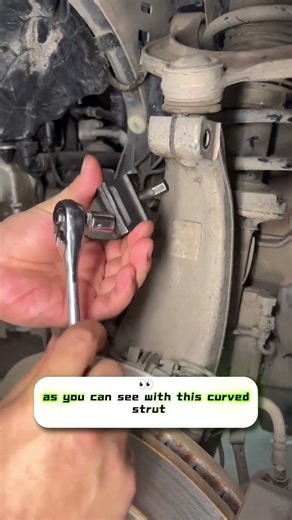 A handy suspension strut spreader tool!