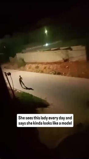 Lady Struts Her Style on a Window Catwalk