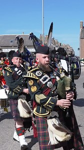 The Royal Regiment of Scotland, led by 4 SCOTS Pipes and Drums playing "Cock o' the North", marching into Peterhead on Saturday 11th May 2024 to be granted the Freedom of Aberdeenshire. The parade included the Band of the Royal Regiment of Scotland, the regimental mascot Corporal Cruachan IV, regimental marching troops and the Colour Party. The official Freedom was conferred on the regiment by the Provost of Aberdeenshire, Cllr Judy Whyte outside Buchan House on St Peter St, in the centre of Pet