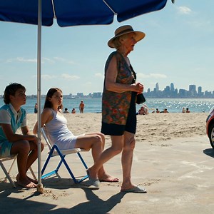 At The Beach With My Kids, I Got A Text: “Leave Quietly. Don’t Tell Your Children…” At the beach with my kids, the day looked like a postcard—blue water off Lake Michigan, sun on the sand, the Chicago skyline faint in the distance. The kind of laughter that’s supposed to mean everything’s fine. My oldest handed me a cup with a smile that didn’t quite reach his eyes. “Here you go, Mom. Lemonade.” My daughters settled under the big umbrella like they were arranging a picture. “We should do this mo