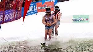 Ending the season with a splash at the Splashdown Pond Skim. | Steamboat Resort
