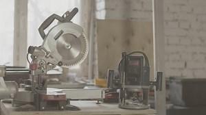 Carpenter measuring wood in his shop - Free Stock Video