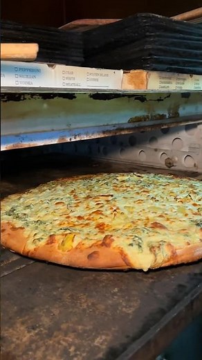The legendary ARTICHOKE PIZZA in the making from Artichoke Basille’s Pizza NYC! 🍕🔥🤤 #DEVOURPOWER