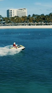 A very special guest is making waves on his way to spread some joy at Hilton Aruba! The holiday season is quickly approaching - who's excited to celebrate with us? 🌴🎅 #HiltonAruba #VisitAruba #CaribbeanChristmas #HolidaySeason | Hilton Aruba Caribbean Resort & The Westerly