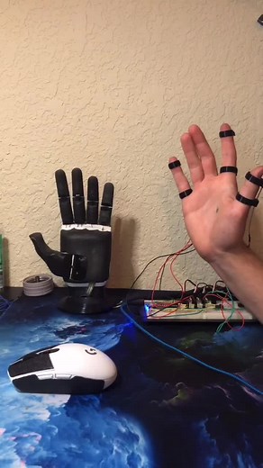 A.I. Enhanced Neurally Controlled Bionic Hand Development