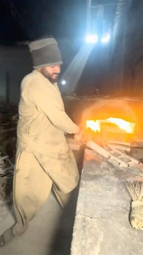 Who is going through the raw material process in the factory?