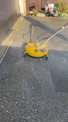 Watch years of grime disappear in seconds! 💦 Our pressure cleaning service restores your surfaces to like-new condition. From driveways to concrete, pavers, and more — we make it spotless! 💪✨ | Grass Master