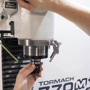 Nicole Setting Up a 6mm Kennametal Single Flute High Performance Carbide Endmill (#2433344) Before She Sends it Through Some Aluminum | Titans of CNC Machining