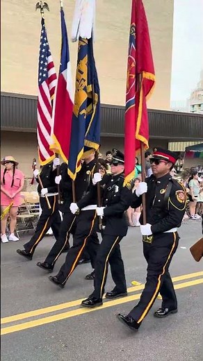 San Antonio First Responder Color Guard and Honor Guard carries colors at Battle of Flowers Parade
