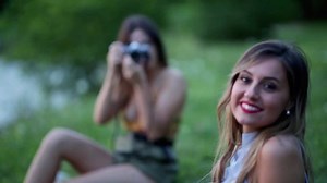 clip-1033875815-stylish-summer-girls-camera