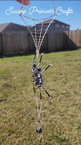 Today's custom was a dark themed spider, meant to hang from a rear view mirror. They specifically requested a web, and I'm glad they did! I love the way it turned out. 🖤🕷 ​#BeadedSpider #HandmadeJewelry #SpiderArt #Whimsigoth #WireWrapped #GothDecor #Suncatcher #SmallBusinessCheck #OdditiesAndCuriosities #Beadwork | Swamp Princess Crafts️