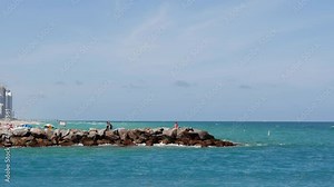 Parallax effect Miami Beach spring break scene Haulover inlet view of highrise buildings reveal in background
