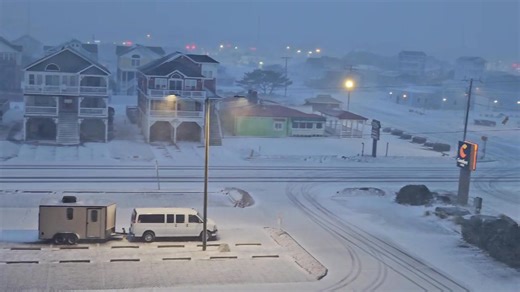 If you wanted to see what the beach road looks like, here you go.... you can see the wind & snow better in our lights.. #TheOuterBanksNC #OBXNow #SnOBX | Ramada Plaza Nags Head Oceanfront