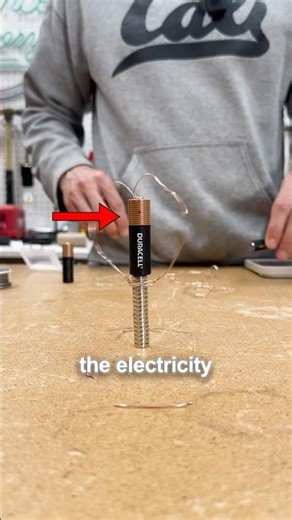 Why does the wire do this!? #science #scienceexperiment #scienceexperiments #tacosai #stem