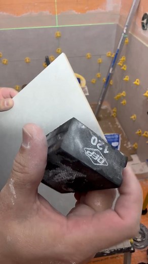 Rough edges? Not on our watch. See the QEP 120 Grit-Medium Diamond Sanding Block in action as it makes quick work of smoothing out this tile's edge. 📷 Vladimir Perez | QEP Co Inc