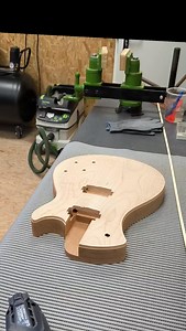 This is the trickiest part of the binding process. The binding needs to be gently pre-bent with heat around the tight lower horn and cutaway before it can be glued in place. Too much heat would cause the binding to melt, too few would generate hairline cracks and discoloration in the material. #springerguitars #luthiery #guitarbuilding #guitarsofinstagram #boutiqueguitars | Springer Guitars