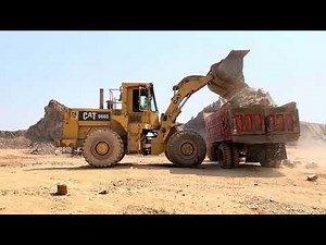 Massive Rocks Loading with Caterpillar Machine | Heavy Equipment in Action