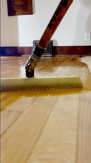 Restoring original hardwood floors by sanding and applying polyurethane (applicator link in bio)