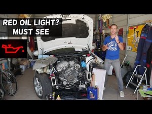 WHY I HAVE RED OIL LIGHT ON MY CAR