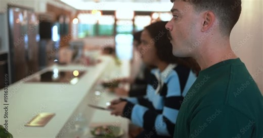 Multiracial couple eating lunch together inside restaurant - Healthy food and people lifestyle concept