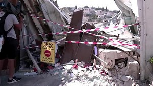 Israeli forces demolish Palestinian shop