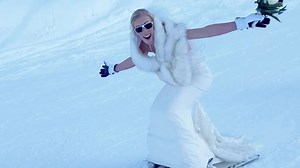 Bride gets hitched at top of mountain - then skis down with groom
